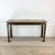This elegant vintage console table is a stunning example of 1970s–80s modernism, combining clean architectural lines with...