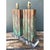 Exuding sophisticated Hollywood Regency charm, this pair of vintage Mid-Century table lamps features sculptural faux...