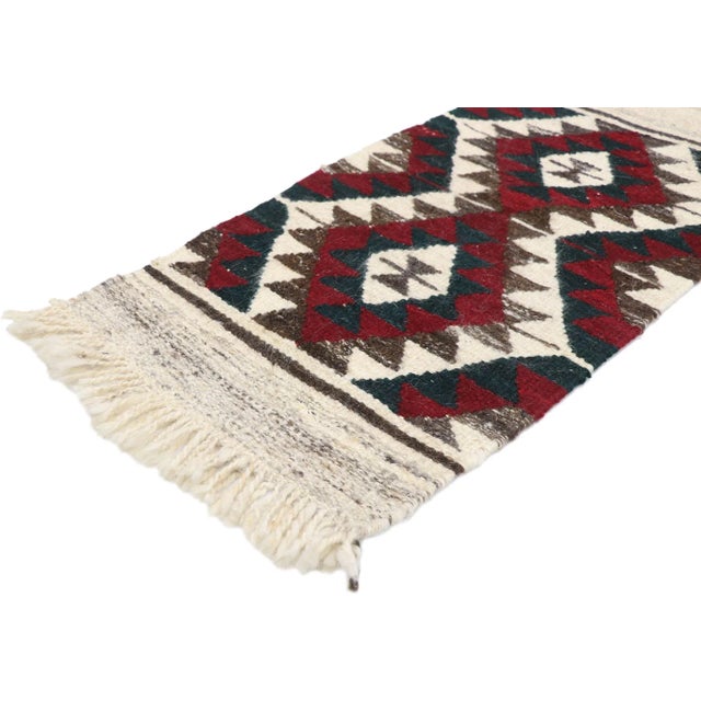 , vintage Persian Shiraz Kilim rug with Tribal style. Full of tiny details and a bold expressive design combined with...