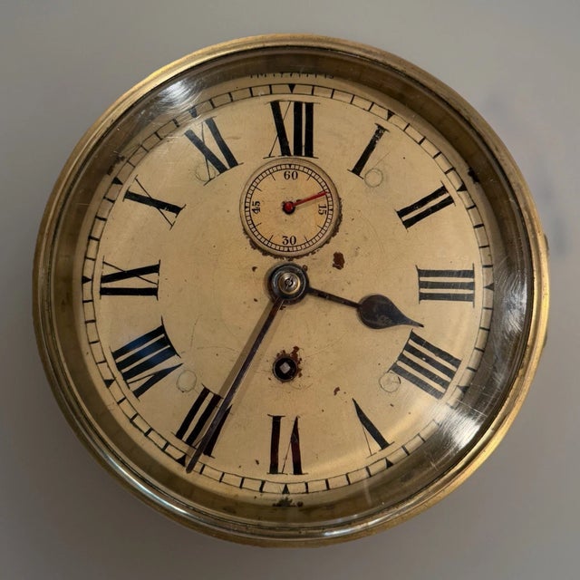 This listing is for a very large antique ships clock. This clock is most likely of English origin. There are no makers...