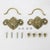 This charming pair of vintage brass cabinet drop pulls features a sculptural fan and sunburst motif radiating from a...
