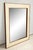Bespoke Parchment mirror with mahogany frame.