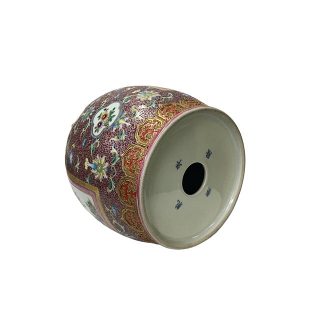 This exquisite porcelain vessel is a stunning example of traditional East Asian craftsmanship, likely from the Chinese or...