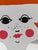 Mid-century Japanese painted steel bookend featuring a stylized anthropomorphic female profile with graphic detailing....
