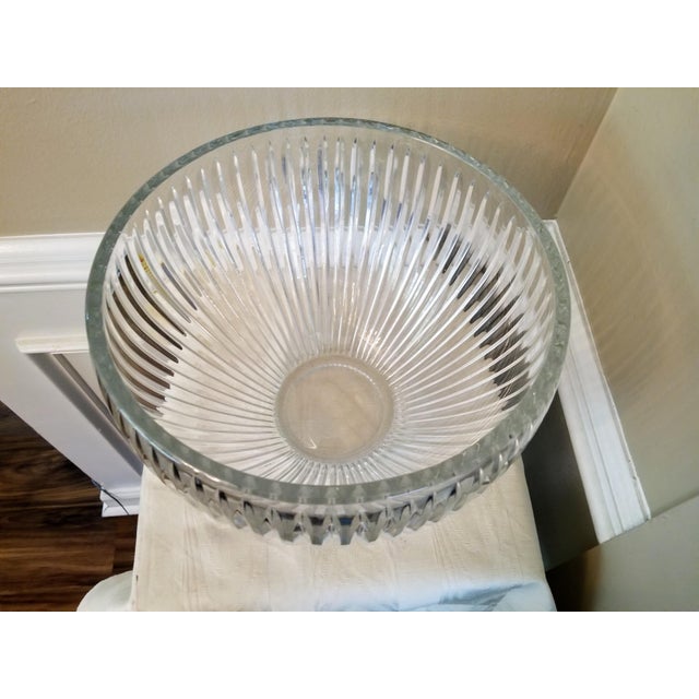 Lovely vintage large ribbed crystal bowl which will make a striking centerpiece filled with your favorite flowers or...