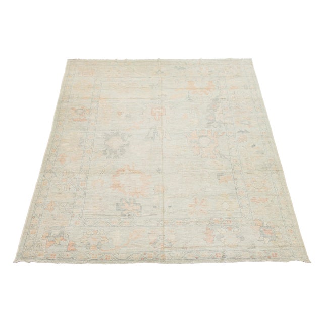 Elevate your space with the understated elegance of this Modern Oushak style rug. Hand-knotted from premium, high-quality...