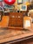 A beautifully crafted antique Victorian oak stationery desk featuring a richly grained oak exterior and an exceptionally...