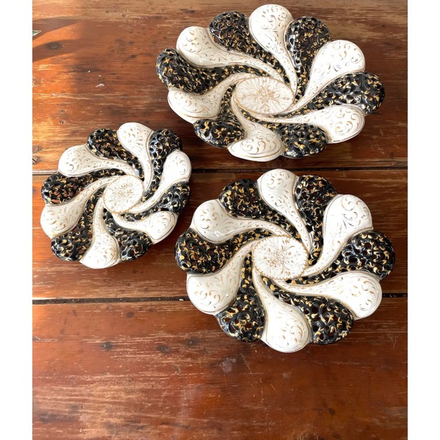 Vintage mid-century set of ceramic bowls, beautifully detailed in 22k gold. Marked. Large: 13” x 11” Medium: 10.5” x 8”...