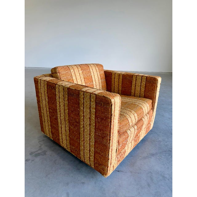 Vintage 1970’s Nubby textured multi tonal stripe Club Chair by Founders Furniture. Textured orange, brown, yellow, and...