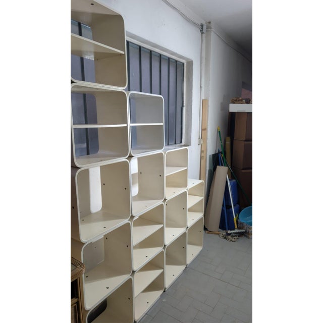 Introducing this stunning White Lacquered Wooden Bookcase created by the legendary Italian architect and designer Carlo de...