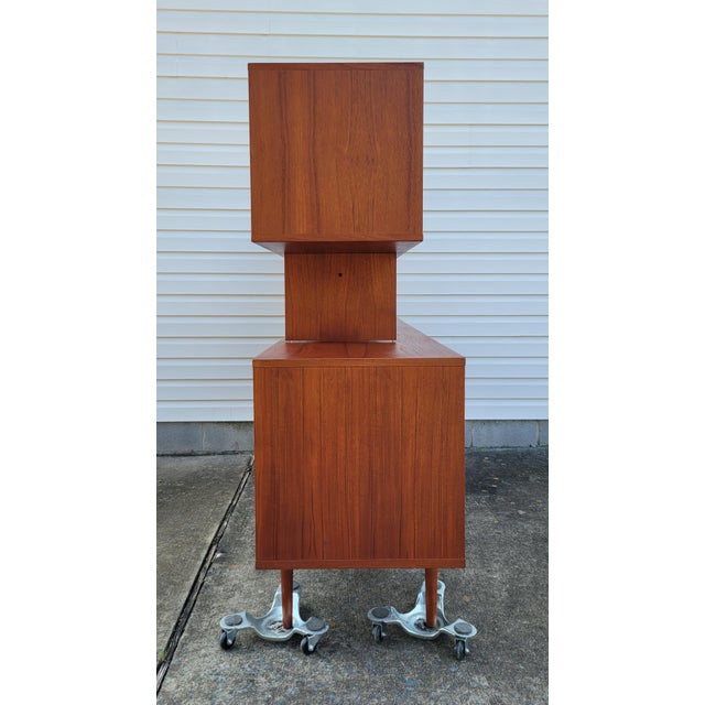 Georgeous mid century tambour door Danish teak credenza with removable floating top created by Jens Quistgaard for Peter...