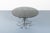 Vintage Italian design round dining table from from 1970s. Sculptural chromed tubular steel base with loose smoked glass...