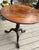 Magnificent mahogany tilt top tea table ascribed to the Salem Massachusetts area. The stepped edge 1 board top showcases a...