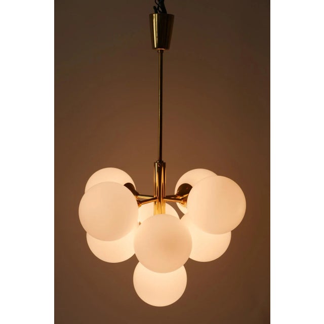 About Amazing nine-armed Mid-Century Modern Sputnik multi-globe chandelier or pendant lamp by Kaiser Leuchten, Germany,...