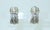 Classic and chic! David Yurman sterling silver earrings with 14K gold accent in a cable style design that takes on the...