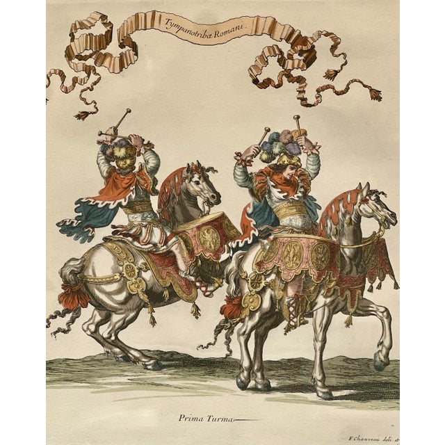 This exceptional hand-colored intaglio engraving is titled "Tympanotribae Romani (Prima Turma)" and stems from the iconic...