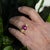 Experience true luxury with the exquisite 18k ring handmade by Keith Davis. Adorned with a lustrous 12.33 carat cabochon...