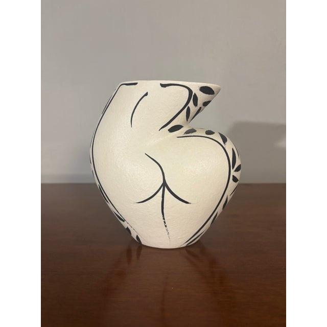 Ceramic vase by American Ceramist Donna Polseno. Beautiful, whimsical, playful yet simple. Vase depicting the natural and...