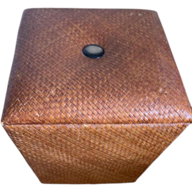 Handmade rattan storage ottoman with a sturdy wooden frame designed for hidden storage. A practical shoe storage bench and...