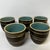 Lovely set of five ceramic glazed sake cups. Grey glaze incised on the outside, turquoise on the inside. Signed by the...