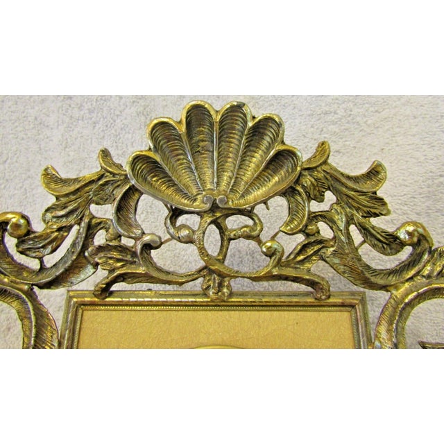 Vintage Mid-Century Modern French Style Ormulu Electric Table Clock Measures 7 1/4" wide, 5 3/4" deep and 9" tall. Time...