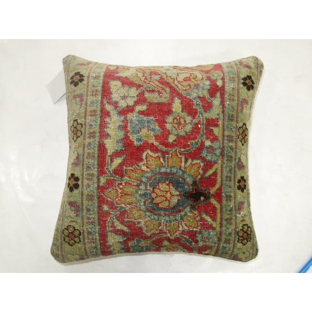 Pillow made from an antique persian tabriz rug