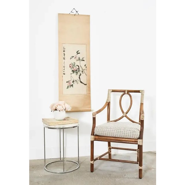 Seasonal autumn Chinese hanging scroll painting depicting colorful Camellias with a calligraphy signature and date....