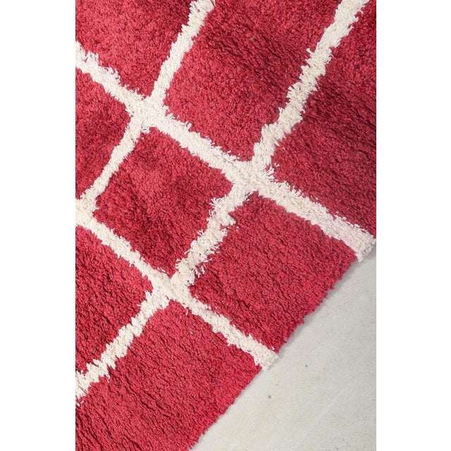 Scandinavian designer Rya rug in cotton with a geometric pattern in red and white tones. A classic example of Scandinavian...