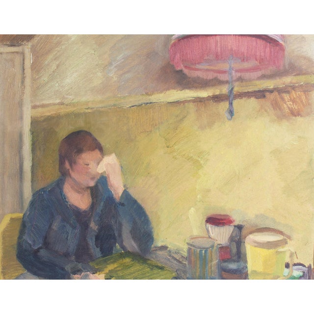 An oil on board painting of a seated woman. This piece features a woman in a blue cardigan, her head resting against her...