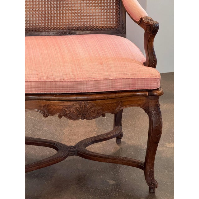19th Century Pair of Carved French Walnut Armchairs With Caned Backs For Sale - Image 6 of 16