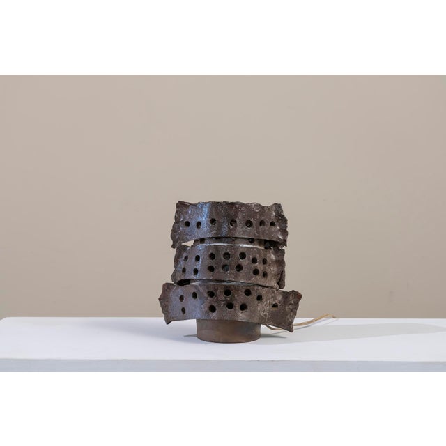 Table lamp made of chocolate-colored ceramic with openwork, a single light inside with a crossbow lamp holder. Owl-shaped...