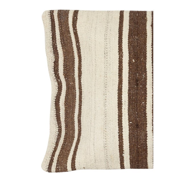 Add a touch of history and warmth to your space with this vintage handmade Turkish hemp kilim cushion cover. Crafted from...