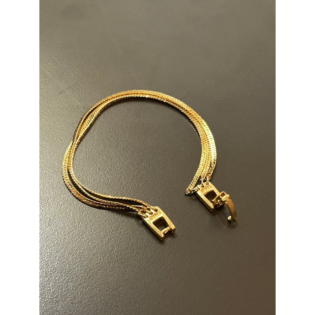 Vintage Monet Gold-Tone Multi-Strand Flat Weave Chain Bracelet – Iconic 1970s/1980s Statement Jewelry For Sale - Image 10 of 13