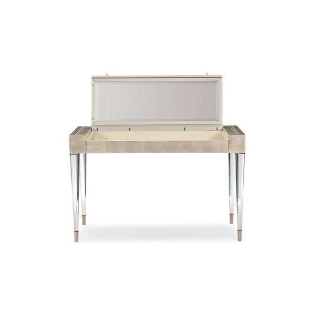 Relax and enjoy a moment of respite as you sit behind this chic vanity. You can’t help but love the pretty details and...