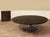Quality, dark mahogany perimeter leaf table opens to 90 inches in diameter and seats 10-12 Expandable round to round...