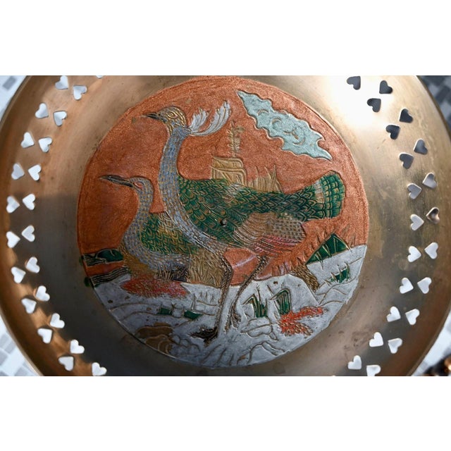 A beautiful piece reminiscent of cabinets of curiosities and interiors that inspire wanderlust… This footed bowl in...