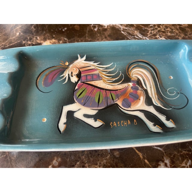 Vintage Sascha Brastoff "Star Steed" Ashtray in teal & gold (Art Pottery). Artist logo.