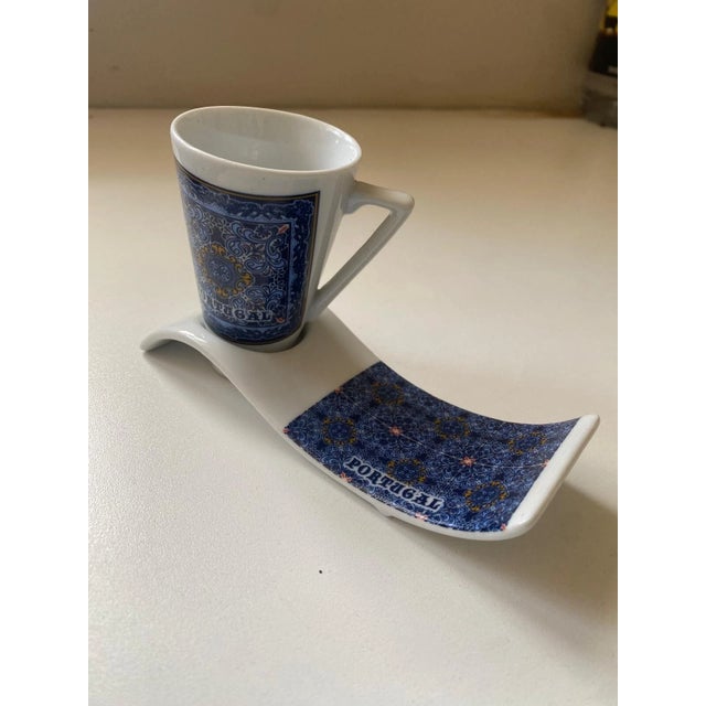 Bring a piece of Portugal into your home with this beautifully crafted ceramic espresso cup and matching tray set. Adorned...