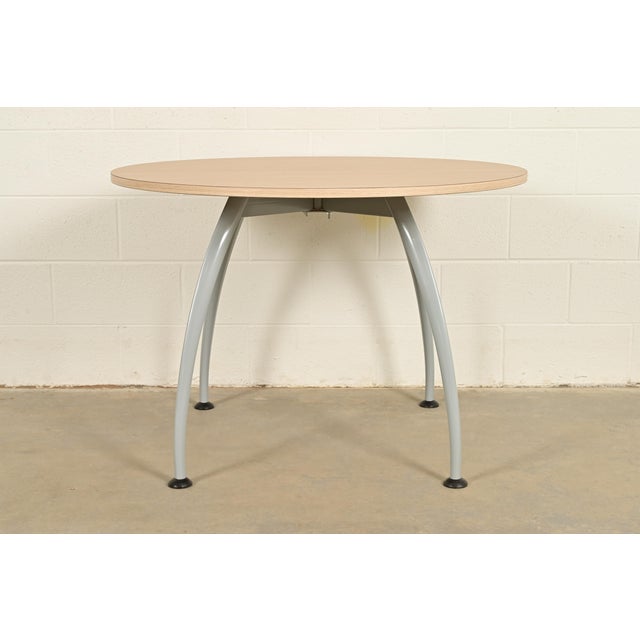 A sleek and stylish Modern or Mid-Century Modern spider leg round dining table, breakfast table, or game table In the...