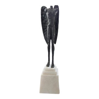 Global Views Cast Iron Winged Torso Sculpture on Solid Alabaster Pedestal, After Alberto Giacometti, 15.5" For Sale
