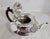 A fine george v sterling silver teapot dating to 1912, designed in the georgian style and displaying elegant early 20th-...