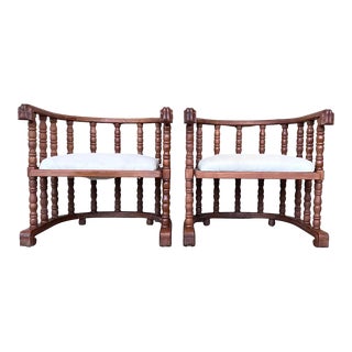 Pair of Spanish Slatted Barrel Back Hand Carved Chairs For Sale