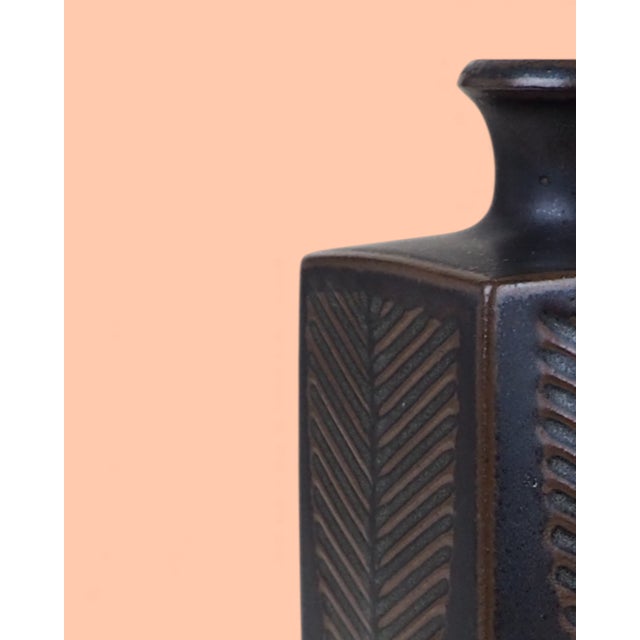 A stunning example of Danish ceramic art from the Knabstrup pottery. This vase belongs to the "Nautilus" series, designed...