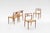 A refined classic of Danish mid-century design, this set of 4 Model 79 dining chairs designed by Niels Otto Møller and...
