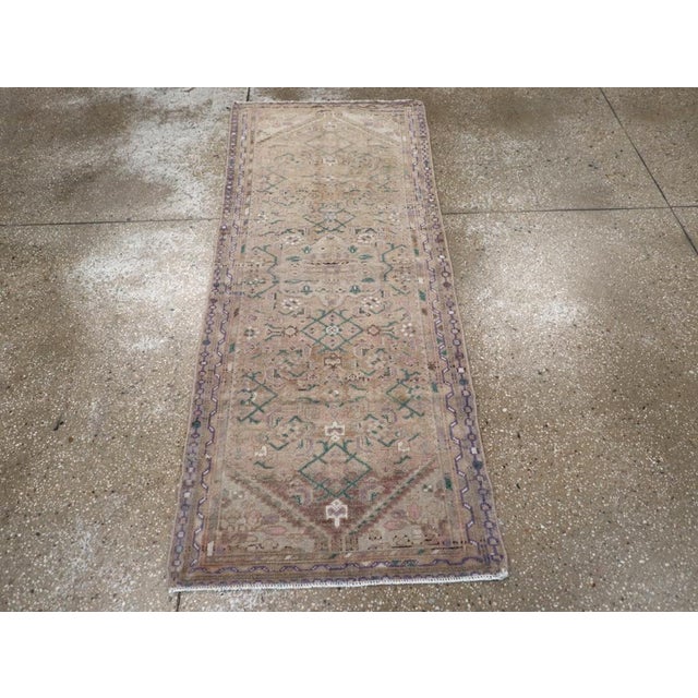 A vintage Persian Malayer throw rug handmade during the Mid-20th century. Measures: 2' 6" x 6' 0"