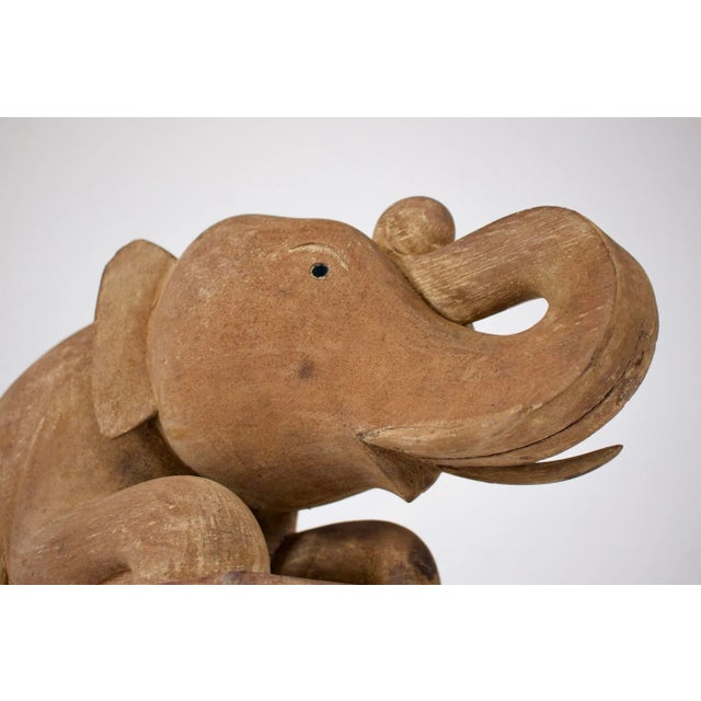 Carved solid wood elephant guardian, burma, mandalay period, circa 1900. Provenance: estate of art dealer claude de...