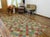 This stunning hand-knotted Afghan Balouchi rug is a captivating addition to any decor. Crafted by skilled artisans, it...