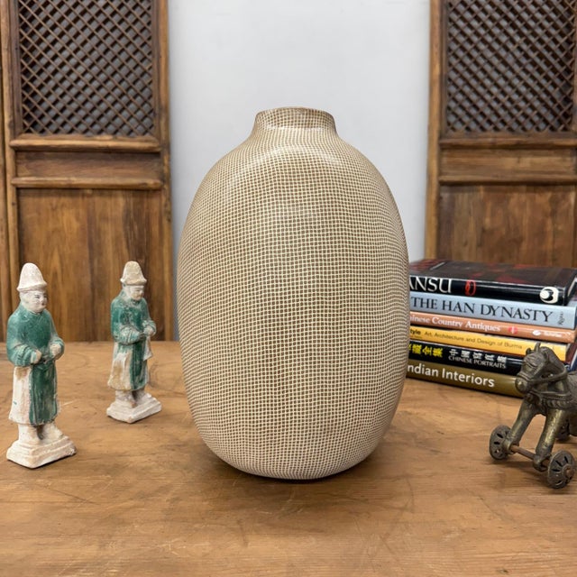 "About This Piece About This Piece For those who appreciate subtle artistry, this vase is a masterclass in understated...