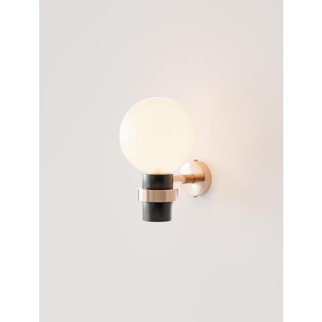 Magda ii wall lamp in brass, aluminum & blown glass by studio marine breynaert. Dimensions: w 15 x d 19 x h 23.5 cm....