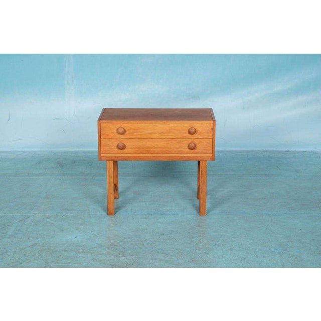 Atmospheric and completely renovated 2-drawer chest of drawers from Sweden, designed in the 1960s. This compact cabinet is...